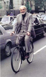Sean Connery rides a bike